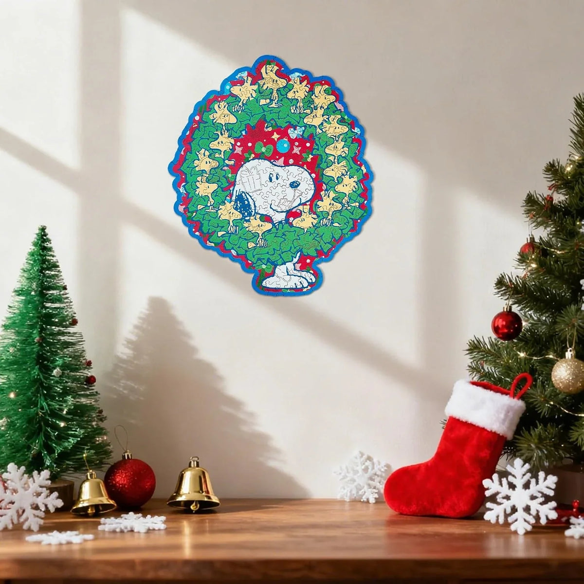 Decorative wall piece with cartoon character in a Christmas wreath